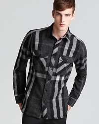 Whether you're off in the woods on a fox hunt or getting croissants at a Montmartre patisserie, this thick shirt provides a warm outer layer that's adorned with the iconic brand's signature check pattern for true heritage appeal. Whether you're off in the woods on a fox hunt or getting croissants at a Montmartre patisserie, this thick shirt provides a warm outer layer that's adorned with the iconic brand's signature check pattern for true heritage appeal.