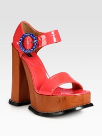 A bejeweled rhinestone buckle adds sparkle to this colorful patent leather design, elevated by a sculpted platform and heel. Leather-covered heel, 6 (150mm)Leather platform, 2 (50mm)Compares to a 4 heel (100mm)Patent leather upper with rhinestone detailAdjustable ankle strapLeather lining and solePadded insoleMade in Italy A bejeweled rhinestone buckle adds sparkle to this colorful patent leather design, elevated by a sculpted platform and heel. Leather-covered heel, 6 (150mm)Leather platform, 2 (50mm)Compares to a 4 heel (100mm)Patent leather upper with rhinestone detailAdjustable ankle strapLeather lining and solePadded insoleMade in Italy