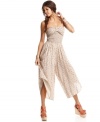 American rag offsets a fitted top with cropped palazzo pants on a polkadot jumpsuit that's perfect for sun drenched days!