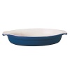The Emile Henry classic oval gratin dish is shallow enough to spread a thin layer of food with a perfectly browned crust or topping. The handles make it easy to remove the dish from the oven with pot holders or oven gloves and is designed with shallow sloping sides, to ease out the cooked food.