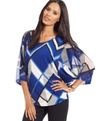Style&co.'s top puts a fresh spin to your look with a bold geometric print. Style&co.'s top puts a fresh spin to your look with a bold geometric print.