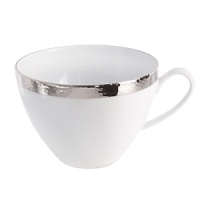 A thick band of sparkling platinum edges each high-quality Limoges porcelain piece in Michael Aram's Silversmith dinnerware collection. It's designed to pair perfectly with a range of settings, from casual to formal. A thick band of sparkling platinum edges each high-quality Limoges porcelain piece in Michael Aram's Silversmith dinnerware collection. It's designed to pair perfectly with a range of settings, from casual to formal.