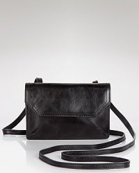 Cut from classic leather with a simple shape, Hobo's crossbody bag has a practical secret: A lined interior with multiple pockets, two compartments, and an ID holder. Cut from classic leather with a simple shape, Hobo's crossbody bag has a practical secret: A lined interior with multiple pockets, two compartments, and an ID holder.