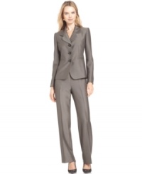 A unique fabric with a touch of shine enhances this elegant petite pantsuit from Le Suit. Add a satin blouse or a colorful shell to complete the look. A unique fabric with a touch of shine enhances this elegant petite pantsuit from Le Suit. Add a satin blouse or a colorful shell to complete the look.