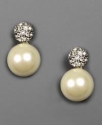 Bask in beauty. These elegant Givenchy earrings feature glass pearls and crystal accents set in silvertone mixed metal. Approximate drop: 1/2 inch. Bask in beauty. These elegant Givenchy earrings feature glass pearls and crystal accents set in silvertone mixed metal. Approximate drop: 1/2 inch.