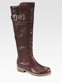 Walk with confidence in this casual-cool leather silhouette, with an easy zip and buckled strap. Stacked heel, 1½ (40mm)Shaft, 16Leg circumference, 12Leather upperSide zip and adjustable buckle strapLeather lining and solePadded insoleImported Walk with confidence in this casual-cool leather silhouette, with an easy zip and buckled strap. Stacked heel, 1½ (40mm)Shaft, 16Leg circumference, 12Leather upperSide zip and adjustable buckle strapLeather lining and solePadded insoleImported