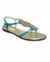 Dainty straps with dramatic decor. The Allik thong sandals by Vince Camuto make a big impact with heavy metallic beading.