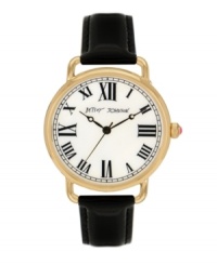 Betsey Johnson does the unexpected and sticks to tradition with this classic watch. Black patent leather strap and round polished gold tone stainless steel case. White dial features black Roman numerals, minute track, three hands and logo. Quartz movement. Water resistant to 30 meters. Two-year limited warranty. Betsey Johnson does the unexpected and sticks to tradition with this classic watch. Black patent leather strap and round polished gold tone stainless steel case. White dial features black Roman numerals, minute track, three hands and logo. Quartz movement. Water resistant to 30 meters. Two-year limited warranty.