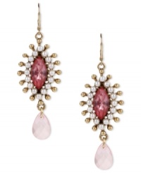 An attention-getter from Betsey Johnson. These teardrop earrings showcase stunning accents in pink-colored crystals, glass pearls and gold tone details. Crafted in antiqued gold tone mixed metal. Approximate drop: 2-1/2 inches. An attention-getter from Betsey Johnson. These teardrop earrings showcase stunning accents in pink-colored crystals, glass pearls and gold tone details. Crafted in antiqued gold tone mixed metal. Approximate drop: 2-1/2 inches.