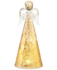 A glowing figure in frosted glass with sparkling gold accents, this angel from Lenox radiates a magical aura to make your holiday even more special. A glowing figure in frosted glass with sparkling gold accents, this angel from Lenox radiates a magical aura to make your holiday even more special.