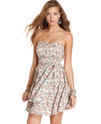 Pretty in print: colorful flowers are in full bloom on this strapless dress from American Rag! Features a tiered bodice and flirty, a-line shape. Pretty in print: colorful flowers are in full bloom on this strapless dress from American Rag! Features a tiered bodice and flirty, a-line shape.