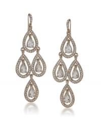 Carolee's glittering pave chandelier earrings are a glamorous finishing touch for your evening look. Crafted with glass crystals in gold tone mixed metal. Approximate drop: 3 inches. Carolee's glittering pave chandelier earrings are a glamorous finishing touch for your evening look. Crafted with glass crystals in gold tone mixed metal. Approximate drop: 3 inches.