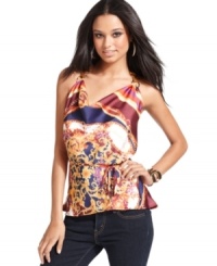 Rock yacht party style in this top from Baby Phat! With its brilliant scarf print and halter strap design, this pretty piece defines casual luxe! Rock yacht party style in this top from Baby Phat! With its brilliant scarf print and halter strap design, this pretty piece defines casual luxe!