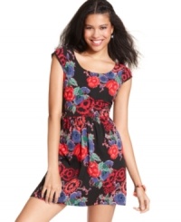 Backed by crisscrossed panels of lace, washed in a whimsical floral-print, Angie's cap sleeve dress makes pretty style yours. Backed by crisscrossed panels of lace, washed in a whimsical floral-print, Angie's cap sleeve dress makes pretty style yours.