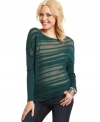 Sheer, asymmetrical stripes soar across the bodice of Jessica Simpson's irresistible pullover sweater.