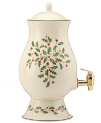 A perfect host for punch, water or mulled wine, this porcelain beverage dispenser is trimmed with green and a holly motif to match the beloved Lenox Holiday dinnerware collection. A perfect host for punch, water or mulled wine, this porcelain beverage dispenser is trimmed with green and a holly motif to match the beloved Lenox Holiday dinnerware collection.