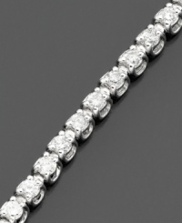 Elegant round-cut diamonds (2 ct. t.w.) are perfectly arranged in this stunning tennis bracelet set in 14k white gold. 2 carat diamond bracelet approximate length: 7-1/4 inches. Elegant round-cut diamonds (2 ct. t.w.) are perfectly arranged in this stunning tennis bracelet set in 14k white gold. 2 carat diamond bracelet approximate length: 7-1/4 inches.