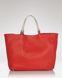 How polished! A supple leather Furla tote realizes day-right refinement, outfitted with handles and a shoulder strap for chic, easy transport. How polished! A supple leather Furla tote realizes day-right refinement, outfitted with handles and a shoulder strap for chic, easy transport.