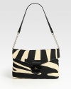 A zebra print adds ultra-chic style to this flap-top design of cotton canvas, topped with patent leather accents. Patent leather and chain shoulder strap, 11 dropBuckled flap closureOne inside zip pocketTwo inside open pocketsFully lined11W X 7H X 3¼DImported