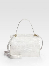 Roomy top-handle bag finished with dual flap tops in rich, exotic croc-skin.Top handle, 5 dropDetachable shoulder strap, 23¼ dropDual magnetic flap closuresOne inside zip pocketOne inside open pocketSuede lining10W X 6¼H X 4¼DImported