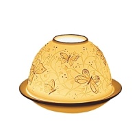 In the world of French art de vivre, Bernardaud is considered the symbol of elite refinement and luxury. A porcelain creation signed by Bernardaud is always appreciated and recognized the world over. Bernardaud artisans use the same technique of hand-sculpting fine, bisque porcelain that was first demonstrated by French artist Paul de Bourgoing in 1828. The glow of a candle shines through the raised and carved surface to contrast light against shadow, revealing a richly detailed design. Bernardaud VotiveLight™ candles add a warm, decorative glow to any room of the home. For a dramatic effect, or to create a festive ambiance, delight your dinner guests by replacing traditional candles with a Bernardaud VotiveLight™. In the world of French art de vivre, Bernardaud is considered the symbol of elite refinement and luxury. A porcelain creation signed by Bernardaud is always appreciated and recognized the world over. Bernardaud artisans use the same technique of hand-sculpting fine, bisque porcelain that was first demonstrated by French artist Paul de Bourgoing in 1828. The glow of a candle shines through the raised and carved surface to contrast light against shadow, revealing a richly detailed design. Bernardaud VotiveLight™ candles add a warm, decorative glow to any room of the home. For a dramatic effect, or to create a festive ambiance, delight your dinner guests by replacing traditional candles with a Bernardaud VotiveLight™.