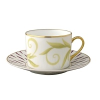 Frivole combines daring originality with soft feminity to create a sophisticated design for the table. Sprawling leaf-work designs add exuberant elegance to this whimsical pattern. Coordinating colors of amethyst and sage with gold trim allow versatility when entertaining formally or casually. Frivole combines daring originality with soft feminity to create a sophisticated design for the table. Sprawling leaf-work designs add exuberant elegance to this whimsical pattern. Coordinating colors of amethyst and sage with gold trim allow versatility when entertaining formally or casually.