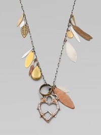 A free-spirited design with various charms, a locket and a heart pendant on a link chain. Copper and silverplated brassLength, about 14½Pendant size, about 2Lobster clasp closureMade in USA A free-spirited design with various charms, a locket and a heart pendant on a link chain. Copper and silverplated brassLength, about 14½Pendant size, about 2Lobster clasp closureMade in USA
