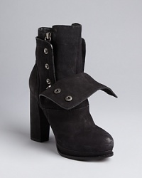 Vera Wang Lavender Label hits all the right style points in these high heel booties. Snap them up for a polished look, or fold the cuffs and let the zippers show for moto edge. Vera Wang Lavender Label hits all the right style points in these high heel booties. Snap them up for a polished look, or fold the cuffs and let the zippers show for moto edge.