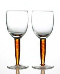 Fire up the casual table with Denby. Simply shaped wine glasses spark drama with brightly colored stems. Shades of red, orange and yellow mix and swirl in luminous glass. Pair with Fire dinnerware, also by Denby. Fire up the casual table with Denby. Simply shaped wine glasses spark drama with brightly colored stems. Shades of red, orange and yellow mix and swirl in luminous glass. Pair with Fire dinnerware, also by Denby.