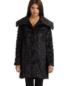 THE LOOKOver-sized shirt collar Front button closure Long sleeves Faux fur design Fully linedTHE FITAbout 33 ½ from shoulder to hemTHE MATERIALPolyesterCARE & ORIGINDry clean Imported