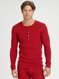 Perfect for cold-weather layering, this long-sleeved henley tee offers incredible warmth and comfort, crafted from soft, smooth cotton.CrewneckFive-button placketCottonMachine washImported Perfect for cold-weather layering, this long-sleeved henley tee offers incredible warmth and comfort, crafted from soft, smooth cotton.CrewneckFive-button placketCottonMachine washImported