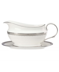 Inspired by the trim on an elegant gown, the graceful Lace Couture gravy boat features an intricate platinum border that combines harmoniously with white bone china for unparalleled style. From Lenox. Inspired by the trim on an elegant gown, the graceful Lace Couture gravy boat features an intricate platinum border that combines harmoniously with white bone china for unparalleled style. From Lenox.