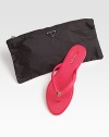 Rubber slip-on with logo detail and matching nylon cosmetic bag.Rubber sole ImportedOUR FIT MODEL RECOMMENDS ordering true whole size; ½ sizes should order the next whole size up. 