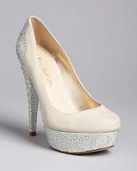 For a blushing bride or any important gala, these Enzo Angiolini platform pumps shine, with rhinestone-studded heels, backs and platforms that make your every step sparkle beautifully. For a blushing bride or any important gala, these Enzo Angiolini platform pumps shine, with rhinestone-studded heels, backs and platforms that make your every step sparkle beautifully.