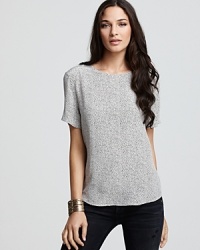 In a chic reptile print, Equipment's oh-so-wearable silk tee makes a luxe addition to your off-duty wardrobe.