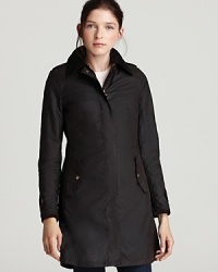 Barbour's lightweight, mid-length coat is is made from extremely durable Thornproof® fabric to withstand inclimate weather and outdoor adventures. And with a stylishly sleek silhoeutte, form meets function. Barbour's lightweight, mid-length coat is is made from extremely durable Thornproof® fabric to withstand inclimate weather and outdoor adventures. And with a stylishly sleek silhoeutte, form meets function.