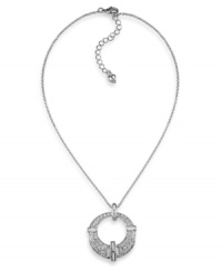 Elegance comes full circle. Carolee's glitzy circle pendant is decorated with glass crystals set in imitation rhodium-plated mixed metal. Approximate length: 16 inches +2-inch extender. Approximate drop: 1-1/4 inches. Elegance comes full circle. Carolee's glitzy circle pendant is decorated with glass crystals set in imitation rhodium-plated mixed metal. Approximate length: 16 inches +2-inch extender. Approximate drop: 1-1/4 inches.