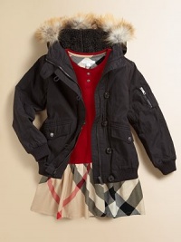 Luxurious golden fox fur trims the hood of this bomber-style parka that lets her enjoy winter while staying warm.Hood with removable golden fox fur trimButton neck tabShoulder epaulettesHidden zip close under button placketZip pocket on one sleeveRibbed knit cuffs and waistFront flap pocketsFully linedCotton/nylonMachine washImportedFur origin: Finland Please note: Number of buttons may vary depending on size ordered. Luxurious golden fox fur trims the hood of this bomber-style parka that lets her enjoy winter while staying warm.Hood with removable golden fox fur trimButton neck tabShoulder epaulettesHidden zip close under button placketZip pocket on one sleeveRibbed knit cuffs and waistFront flap pocketsFully linedCotton/nylonMachine washImportedFur origin: Finland Please note: Number of buttons may vary depending on size ordered.