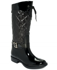 The quilted upper and lace-up accent at the top of the shaft allow Khombu's Shelby boots to maintain their charm all while being completely waterproof and shiny. The quilted upper and lace-up accent at the top of the shaft allow Khombu's Shelby boots to maintain their charm all while being completely waterproof and shiny.