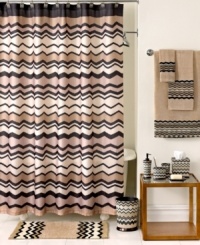 With a distinctly rustic ambiance, this Lauren bath rug from Avanti boasts a playful zigzag motif in warm tones of ivory, beige and black. Finished with a chenille woven base and skid-resistant latex backing. With a distinctly rustic ambiance, this Lauren bath rug from Avanti boasts a playful zigzag motif in warm tones of ivory, beige and black. Finished with a chenille woven base and skid-resistant latex backing.