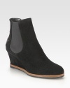 A leather logo detail completes this comfortable wedge silhouette of fine Italian suede. Self-covered wedge, 2¾ (70mm)Suede upper with elastic panels and leather accentLeather liningRubber solePadded insoleMade in Italy