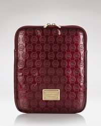 This effortless iPad case captures the modern ease of MICHAEL Michael Kors with its practical design and glossy finish. This effortless iPad case captures the modern ease of MICHAEL Michael Kors with its practical design and glossy finish.