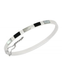 The essence of style and elegance, polished bangle looks stunning solo as well as layered with other bangles. Crafted in sterling silver with rectangular accents in onyx and Mother of Pearl. Approximate diameter: 2-5/16 x 2-5/8 inches. The essence of style and elegance, polished bangle looks stunning solo as well as layered with other bangles. Crafted in sterling silver with rectangular accents in onyx and Mother of Pearl. Approximate diameter: 2-5/16 x 2-5/8 inches.