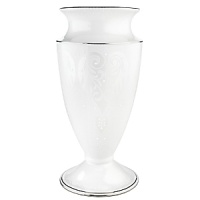 Pearl-like accents and precious platinum give this footed vase a rich, regal look. An ornate design encircling the top portion of the vase is elegant against the opalescent background. Vase is crafted of Lenox fine porcelain and accented with precious platinumHeight: 9 1/2Diameter: 4 1/8 Pearl-like accents and precious platinum give this footed vase a rich, regal look. An ornate design encircling the top portion of the vase is elegant against the opalescent background. Vase is crafted of Lenox fine porcelain and accented with precious platinumHeight: 9 1/2Diameter: 4 1/8