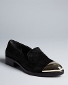 Rachel Roy caps off stylish smoking flats with metallic edge.