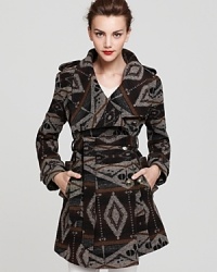 Embrace the exotic with a tribal-print Sam Edelman wrap coat and make it a trend-right fall. Epaulets and textured metal buttons finish the look with edge. Embrace the exotic with a tribal-print Sam Edelman wrap coat and make it a trend-right fall. Epaulets and textured metal buttons finish the look with edge.