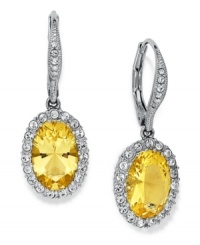 Canary yellow sings in these lever-back drop earrings from Eliot Danori. Crafted from silver-tone brass and cubic zirconia (3 ct. t.w.), and surrounded by sparkling accents, the earrings are a glamorous complement. Approximate drop: 3/4 inches. Canary yellow sings in these lever-back drop earrings from Eliot Danori. Crafted from silver-tone brass and cubic zirconia (3 ct. t.w.), and surrounded by sparkling accents, the earrings are a glamorous complement. Approximate drop: 3/4 inches.