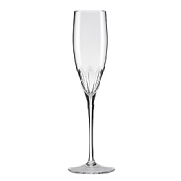 Camelia Court stemware by kate spade new york is rendered in beautifully cut European crystal in a classic champagne flute silhouette with an etched petal design.