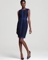 Cool crochet creates color blocking on this BCBGMAXAZRIA sheath dress, effortless for the office and sophisticated for off-hours. Punctuate the sleeveless style with glossy pumps and look sharp on client calls.