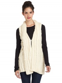 THE LOOKStripes of silky soft rabbit fur on a soft knitDraped shawl collarOpen frontSleevelessLonger silhouetteTHE FITAbout 31 from shoulder to hemTHE MATERIALDyed rabbit furKnit: acrylicCARE & ORIGINDry clean by fur specialistImportedFur origin: China THE LOOKStripes of silky soft rabbit fur on a soft knitDraped shawl collarOpen frontSleevelessLonger silhouetteTHE FITAbout 31 from shoulder to hemTHE MATERIALDyed rabbit furKnit: acrylicCARE & ORIGINDry clean by fur specialistImportedFur origin: China